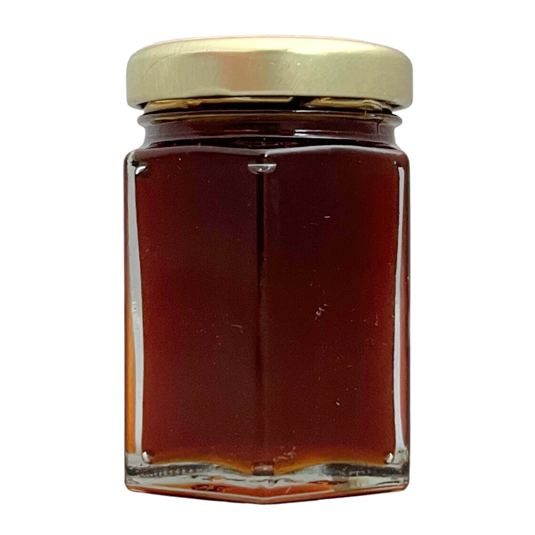 3 oz jar of honey. Gold lid.