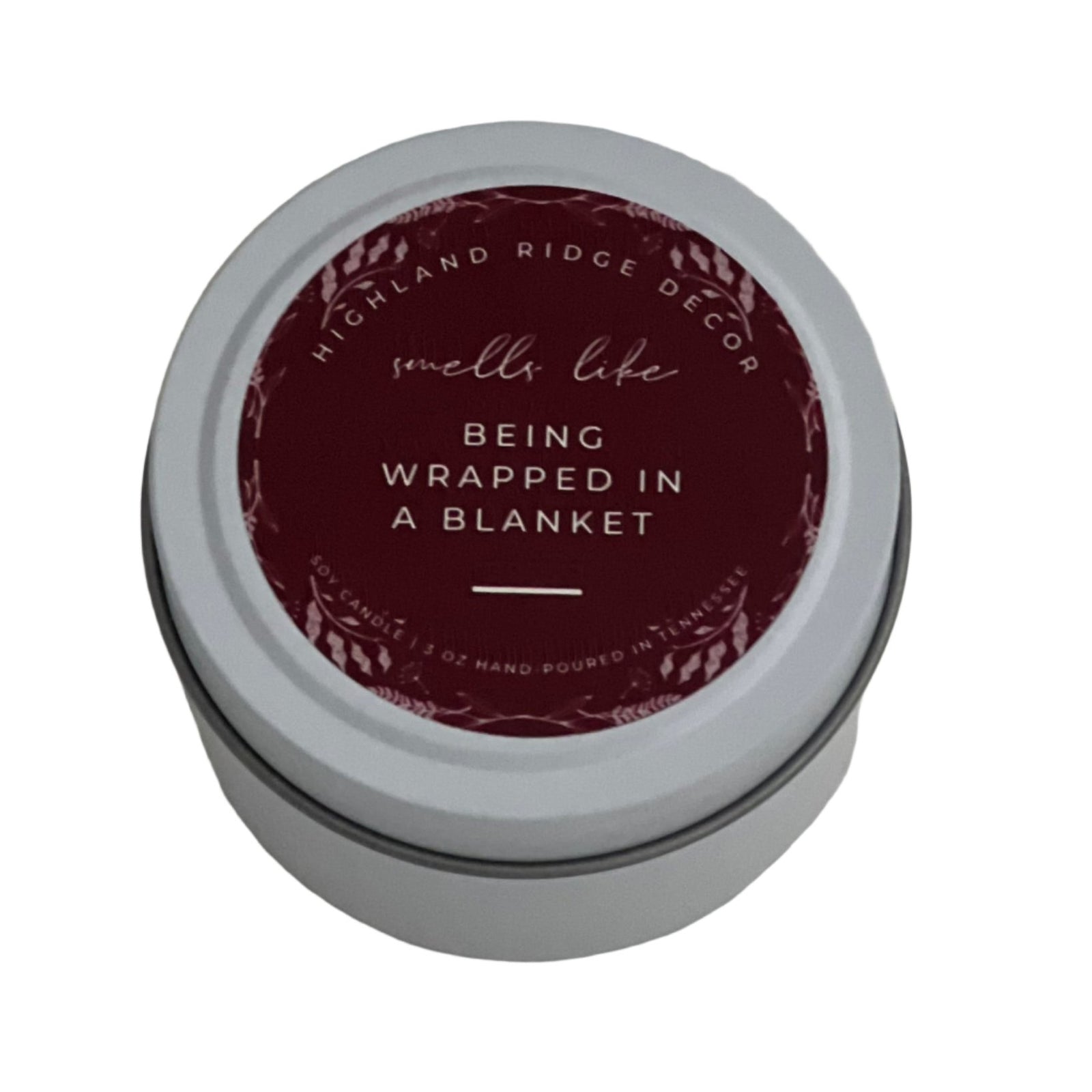 Capture the warmth of a blanket on a night in with the "Being Wrapped in a Blanket" tin candle from Highland Ridge Decor. 3 oz tin candle.