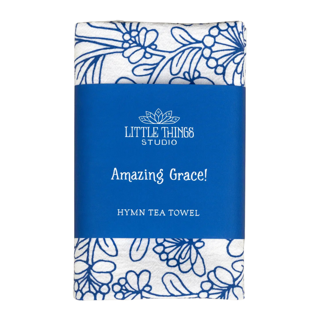 cotton kitchen towel floral design and hymn lyrics.