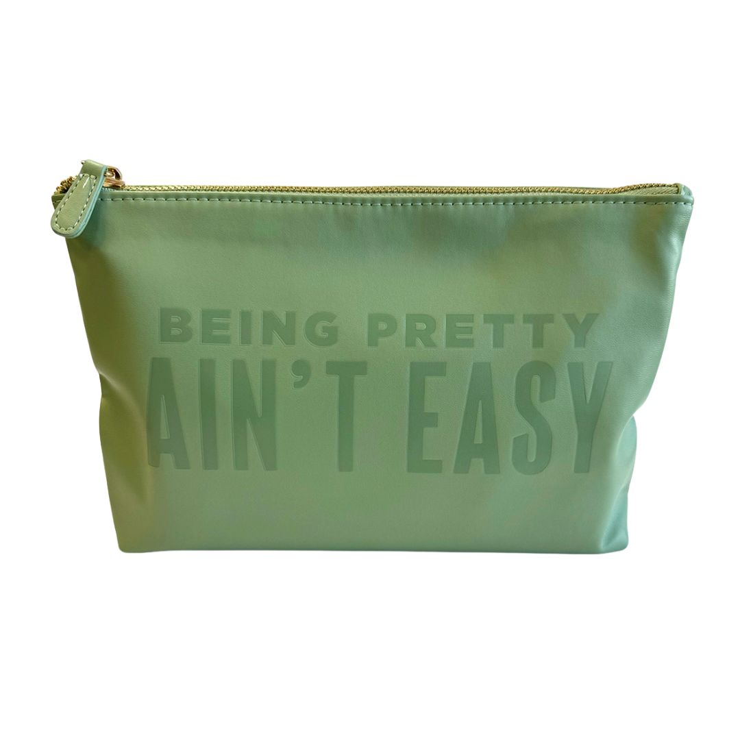 green faux leather catch all pouch, lined with zipper.