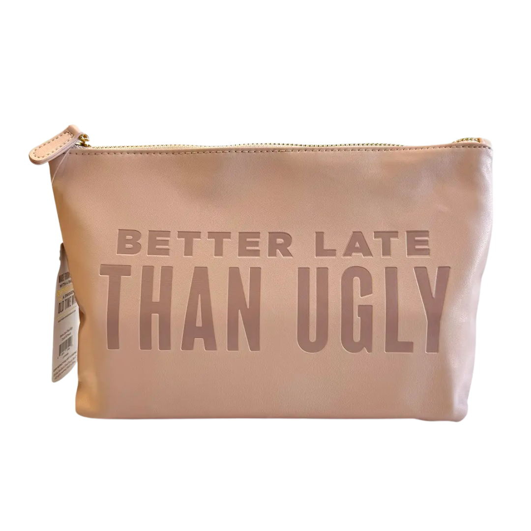 pink faux leather catch all pouch, lined with zipper.