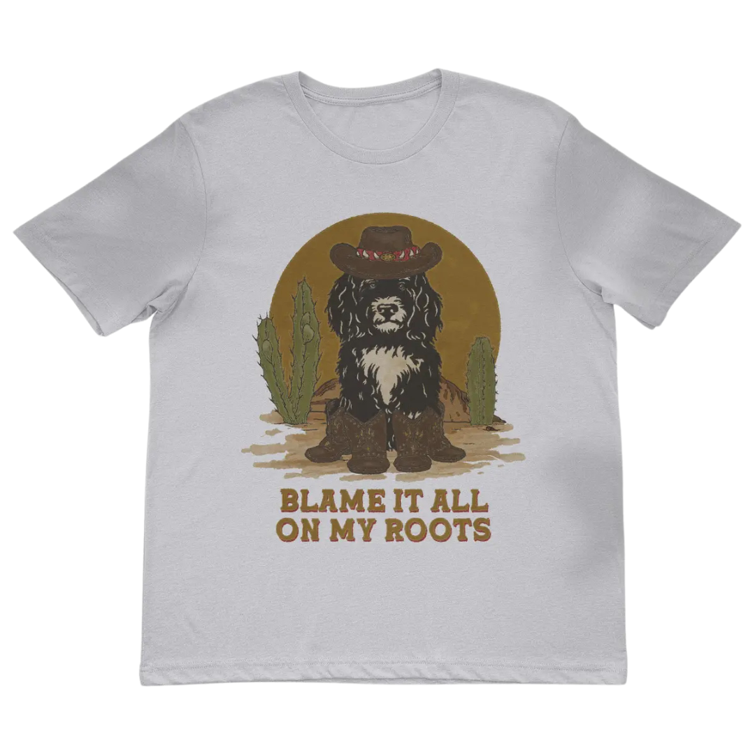 Tan youth shirt "Blame it all on My Roots" Dog in cowboy hat and boots. 
