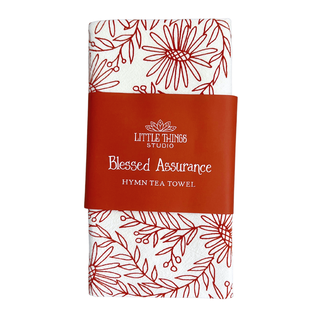 cotton kitchen towel floral design and hymn lyrics.  