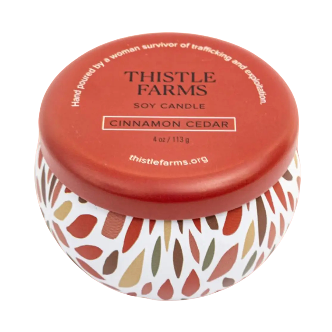 4 oz. candle is made from 100% pure soy wax. comes in red floral tin with lid. 