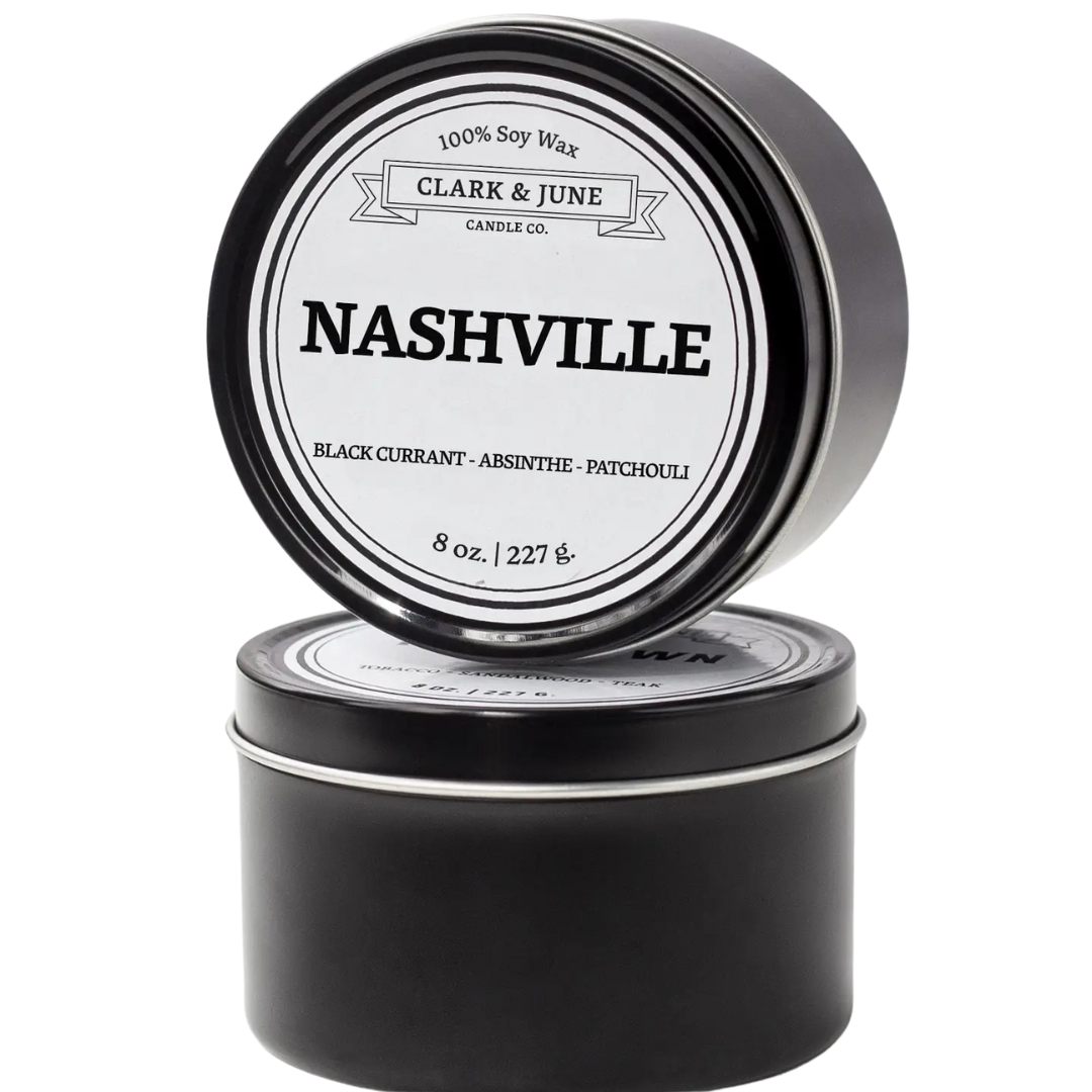 "Nashville candle" Scent Black Currant, Absinthe, and Patchouli. Comes in 8 oz black tin.