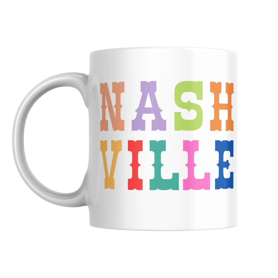 11 oz white ceramic mug with colorful lettering. 