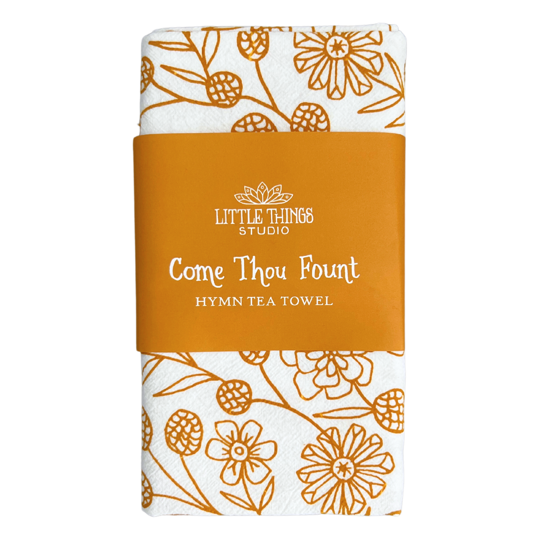 cotton kitchen towel floral design and hymn lyrics.