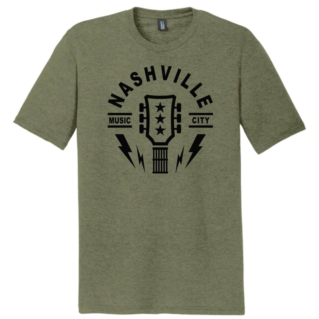 Forest green shirt says "Nashville, music city" with guitar headstock and lightning bolts. 