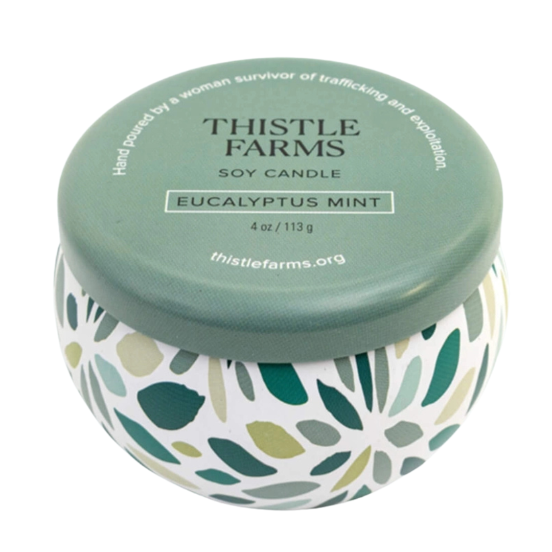 4 oz. candle is made from 100% pure soy wax. comes in green floral tin with lid. 
