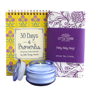 Gift set with calendar, tea towel and candle. 