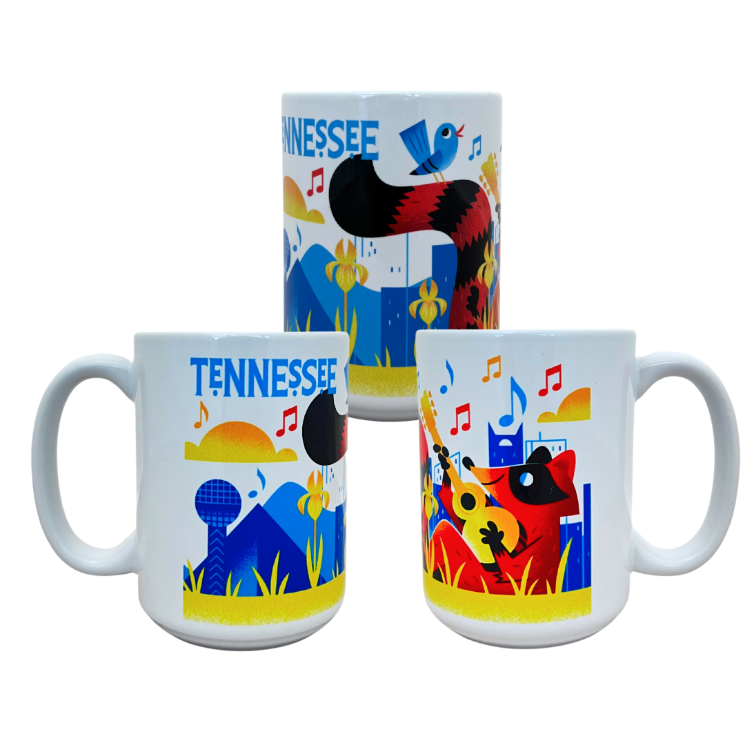 16 oz white mug that says Tennessee featuring racoon playing guitar, a blue bird with other state symbols