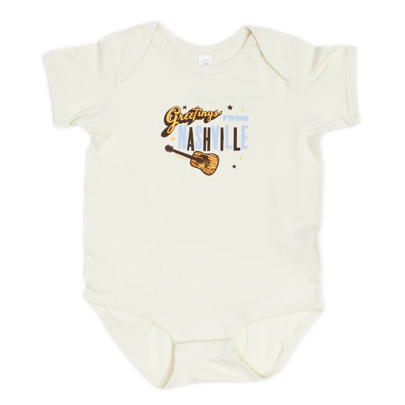 Cream colored Nashville cotton onesie, features a guitar, "Greetings from Nashville"