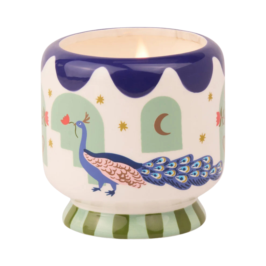8 oz misted lime candle hand painted ceramic with peacocks.