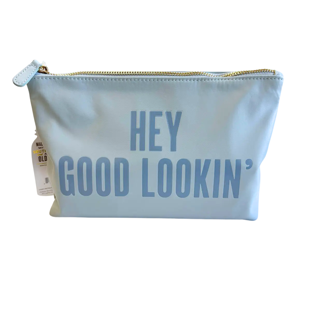 blue faux leather catch all pouch, lined with zipper.