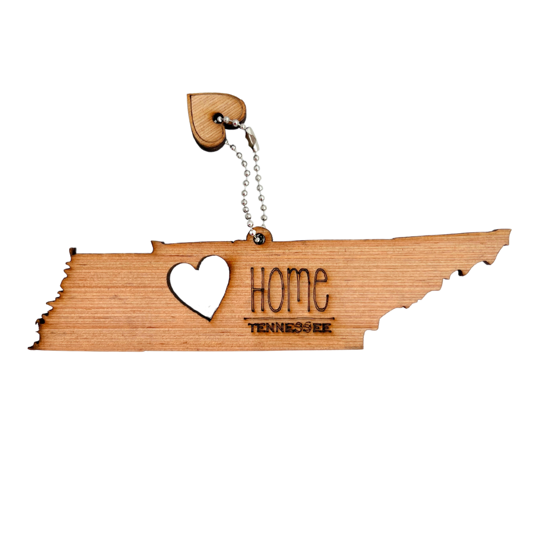 wooden ornament of tennessee, says home.  