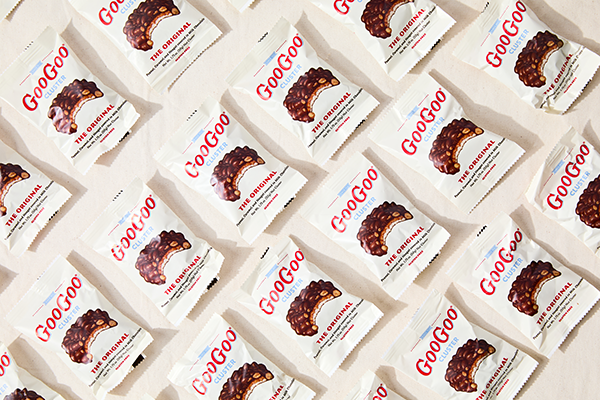 Bulk GooGoo Cluster candy bar with marshmallow nougat caramel and peanuts covered in chocolate.