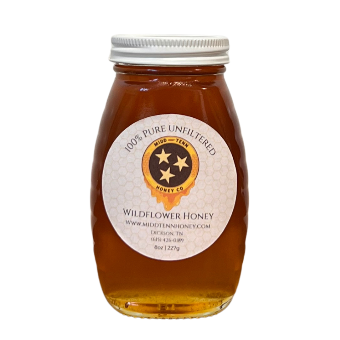 8 oz glass bottle with raw unfiltered Tennessee wildflower honey. 