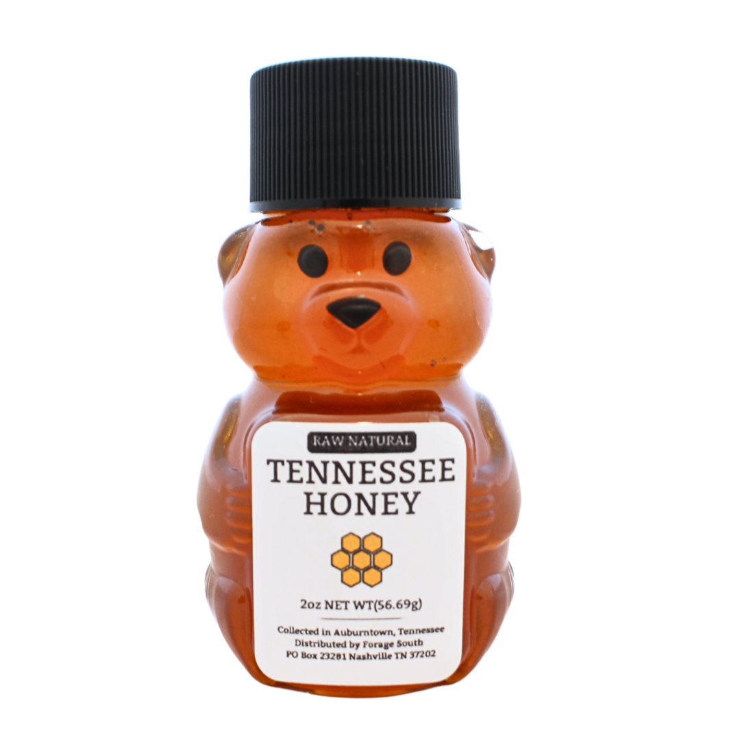 2 oz of tennessee honey in plastic bear bottle with black cap. 
