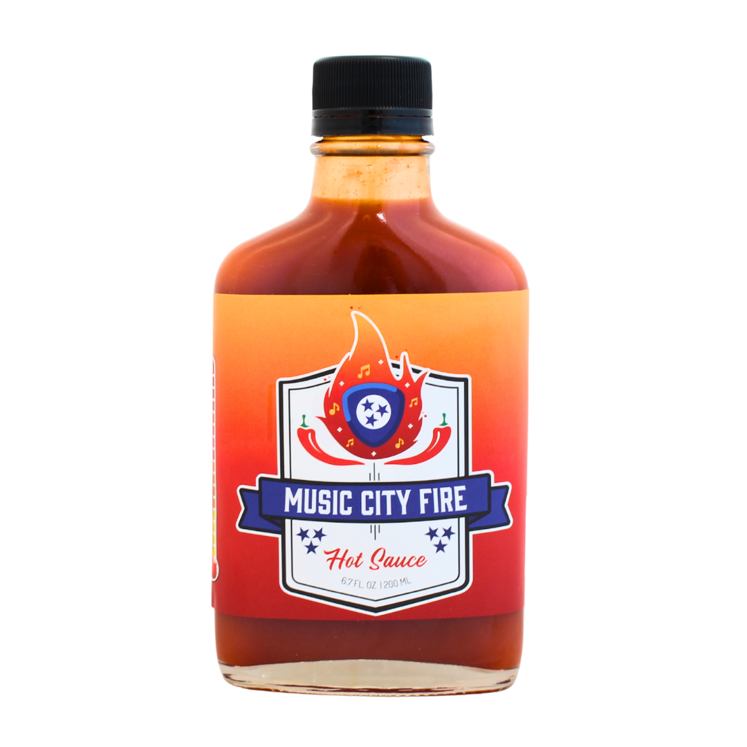 6.7 fl oz ghost pepper "music city fire" hot sauce in glass bottle.