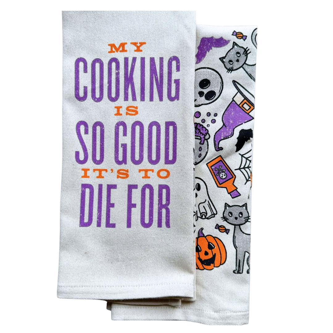 funny saying screen printed on cotton kitchen towel in purple and orange with halloween motif. 