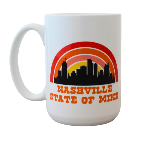 15 oz mug that says "Nashville State of Mind" is a retro font. Features art work of the Nashville skyline under a warm colored rainbow. Great mug that captures the vibe of a 70s morning show.