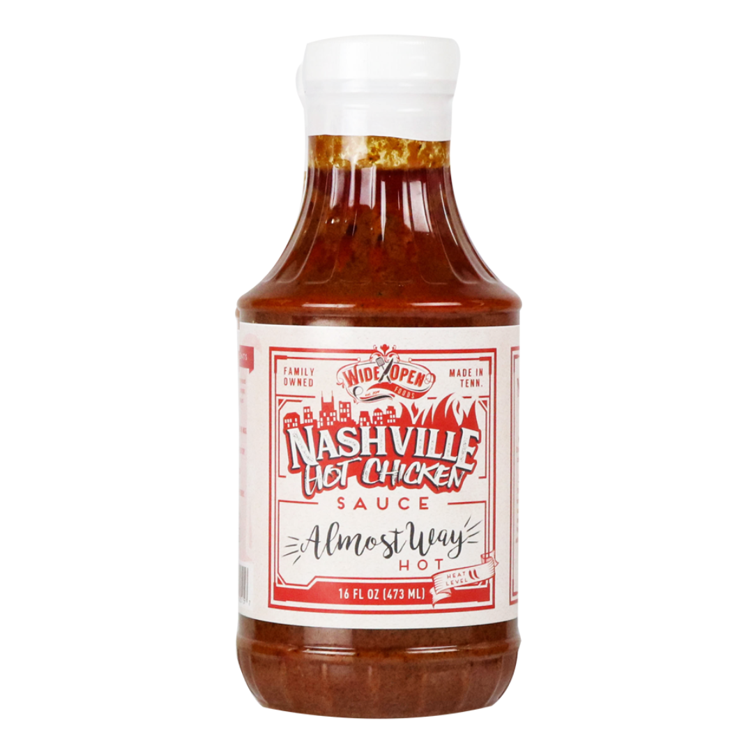 16 fl oz Nashville Almost Way Hot Chicken Sauce in plastic bottle. 