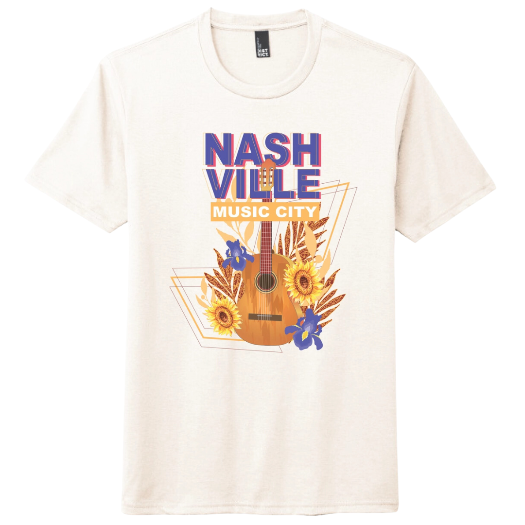 Cream shirt says "Nashville Music City" flowers and guitar.