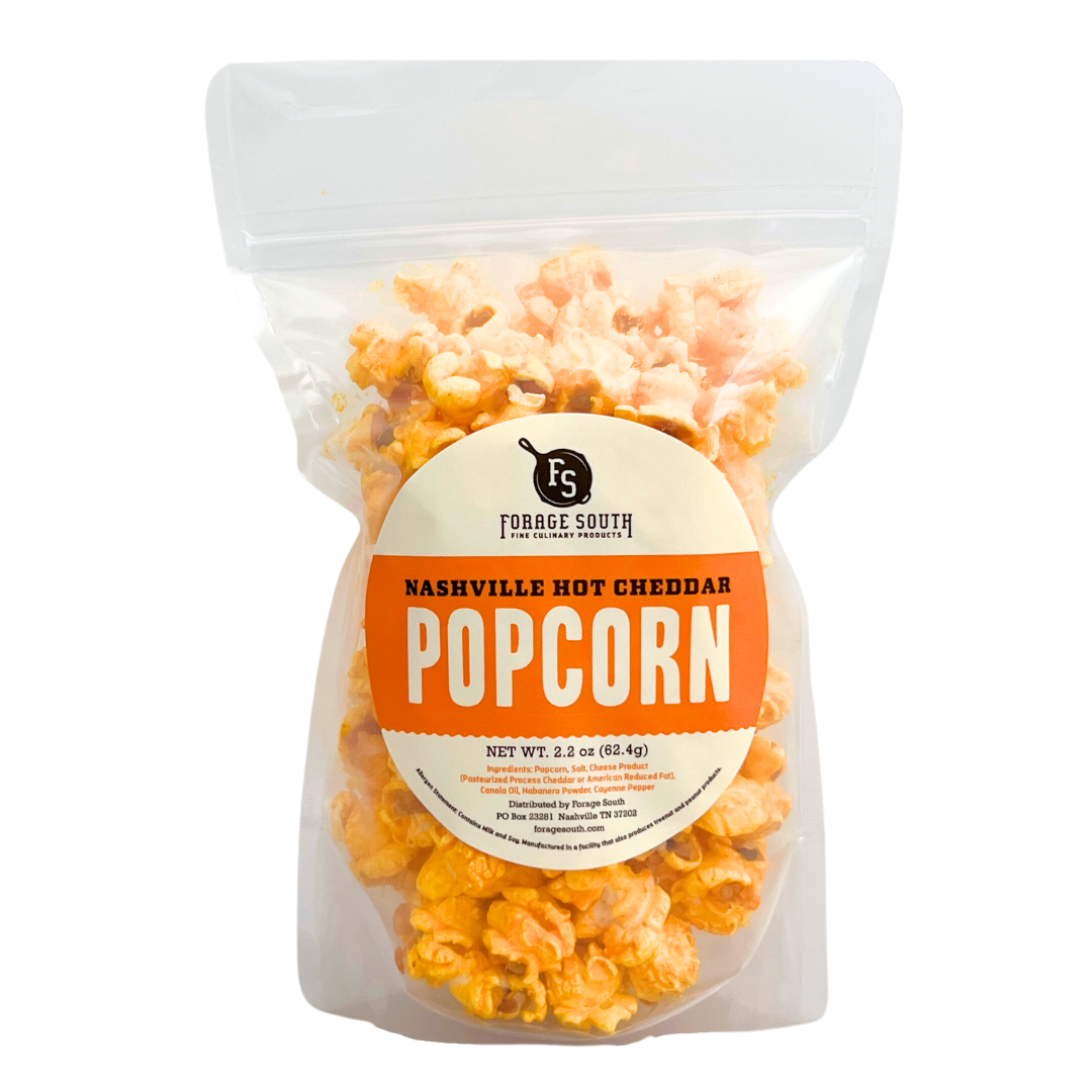 5 cups of "nashville hot" cheddar popcorn in clear bag.
