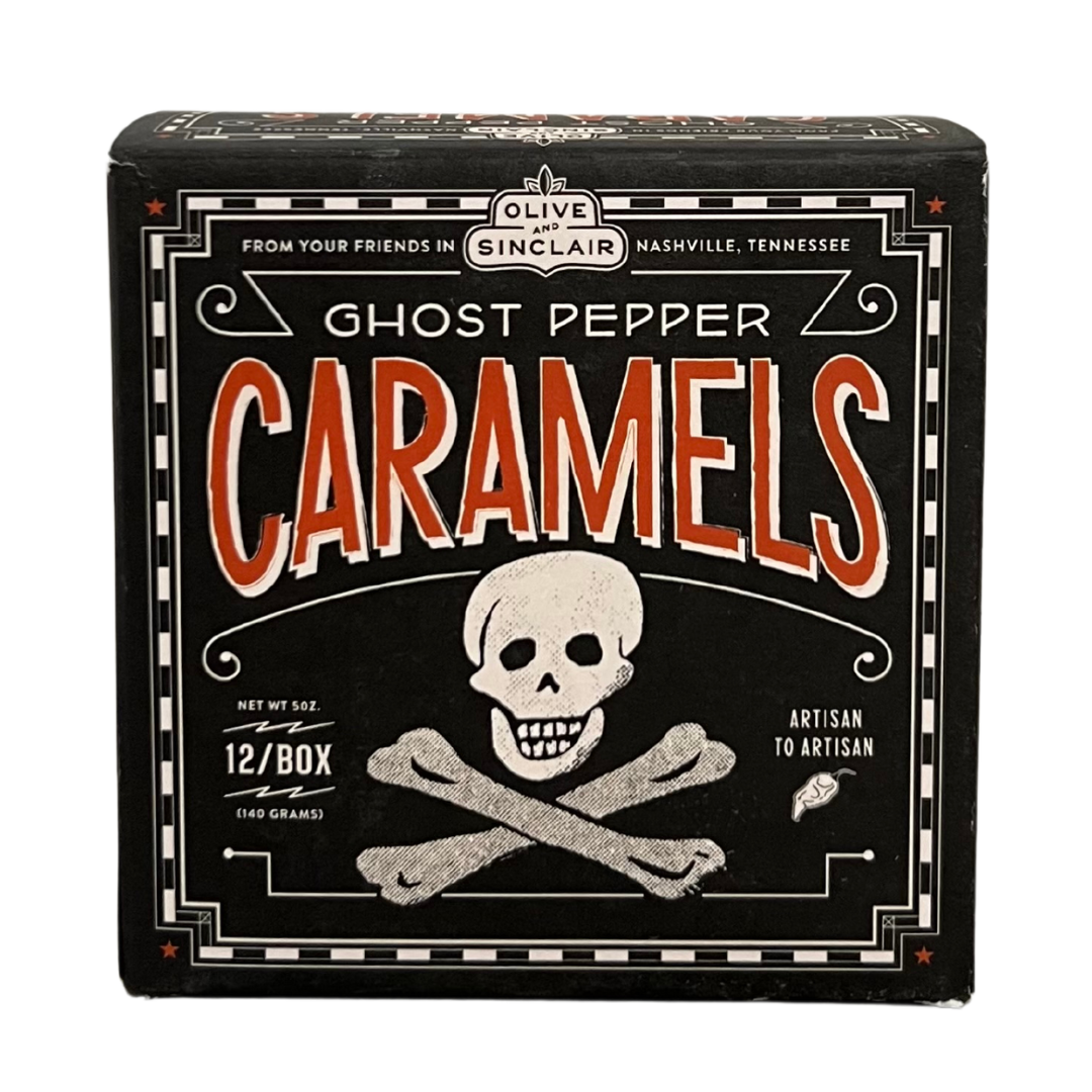 Black box with skull and crossbones, Ghost Pepper Caramels box of 12.