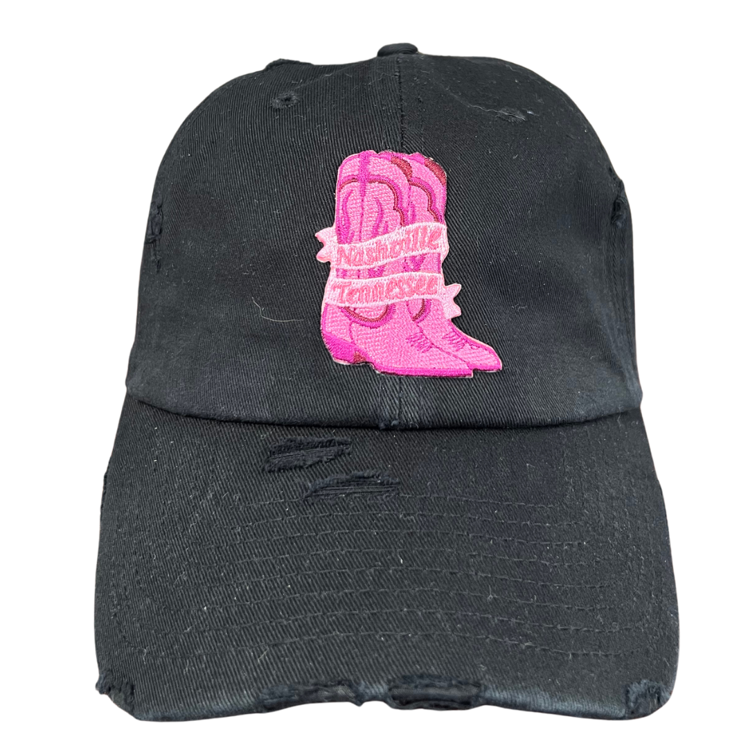 black ball cap with pink boot patch.