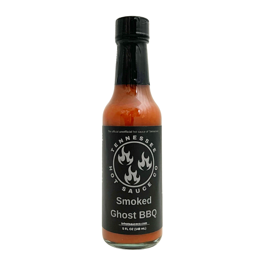 Smoked Ghost BBQ sauce in a clear glass bottle. Company logo on the label. Black resealable cap.