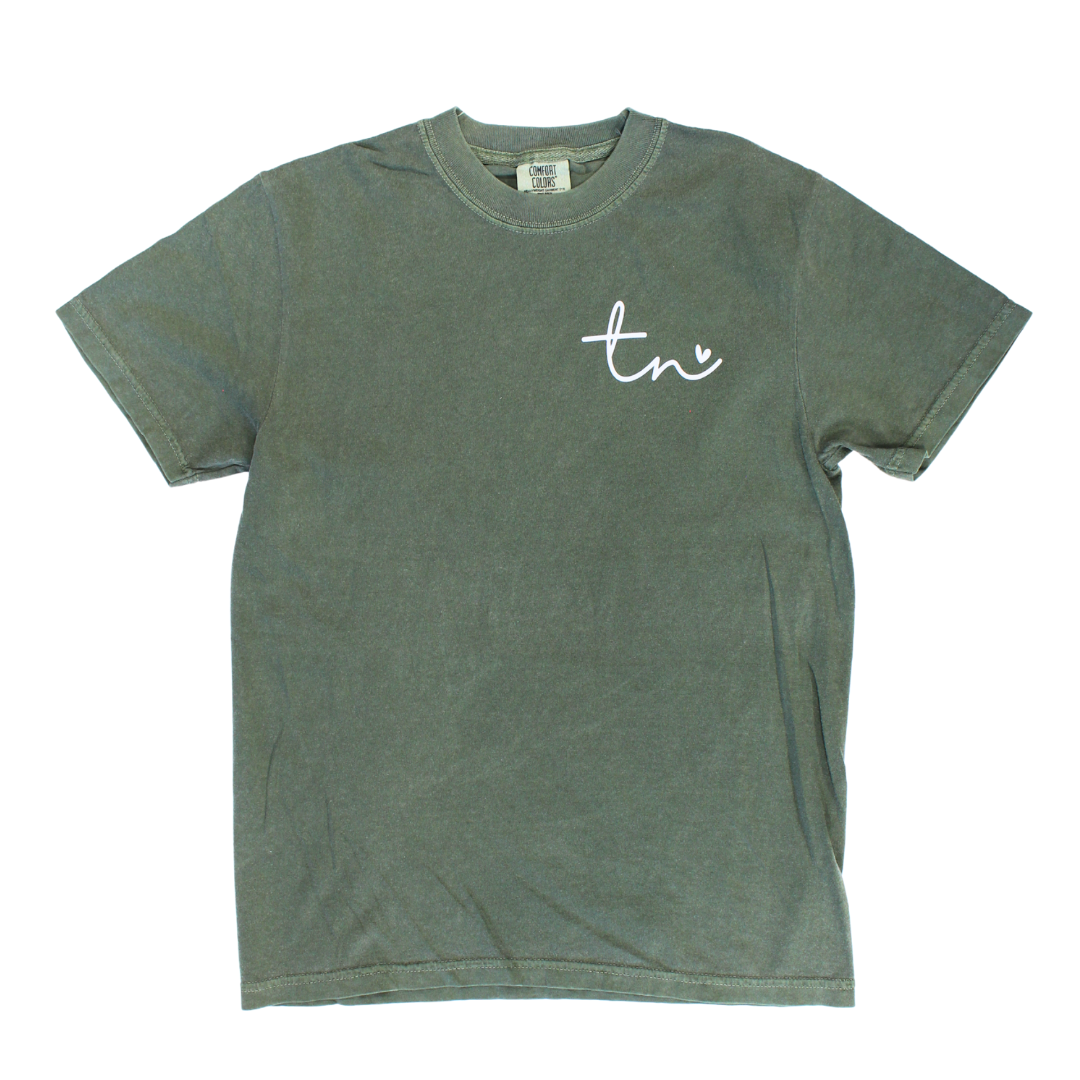 green t shirt with "TN" and a small heart in white.