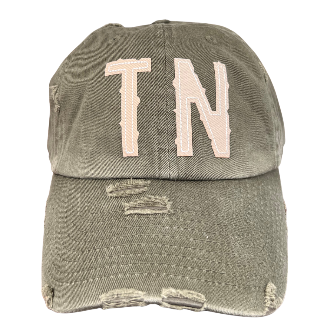 green cotton ball cap with TN aplique. 