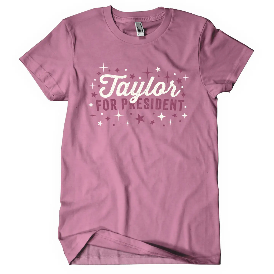 Deep Pink shirt says, "Taylor for President" screen-printed in cream and dark pink. 