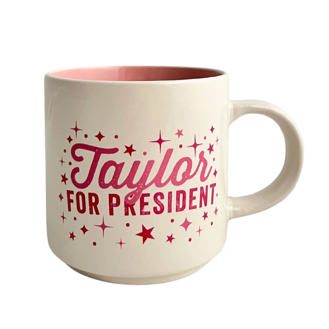Mug that says "Taylor for President" in hot pink lettering.