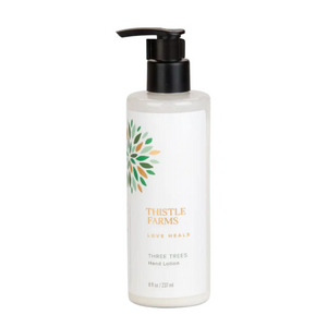 8 fl oz Three Trees Hand Lotion in plastic bottle with pump top, holiday Fir. 