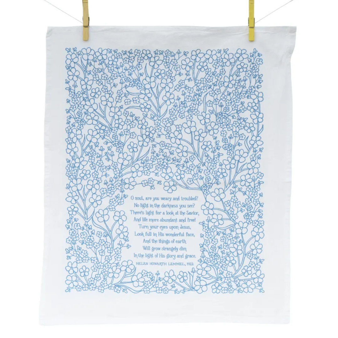 cotton kitchen towel floral design and hymn lyrics.