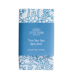 cotton kitchen towel floral design and hymn lyrics.