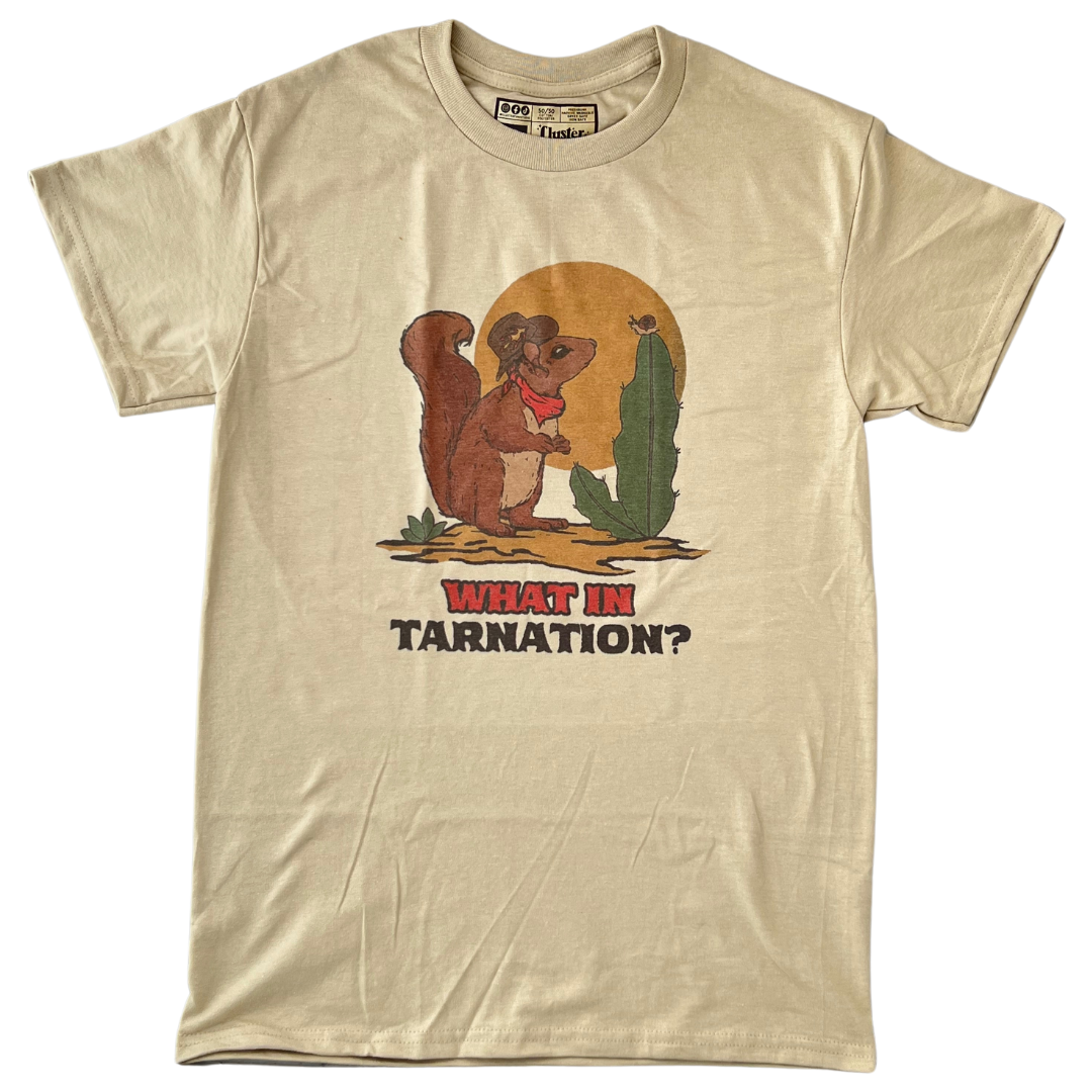 Tan shirt with squirrel, says"What In Tarnation?" in western font. 