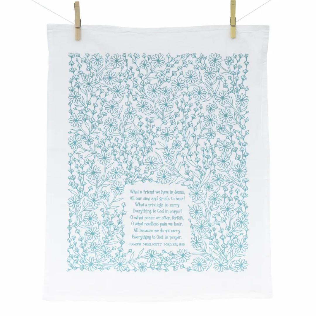 cotton kitchen towel floral design and hymn lyrics.