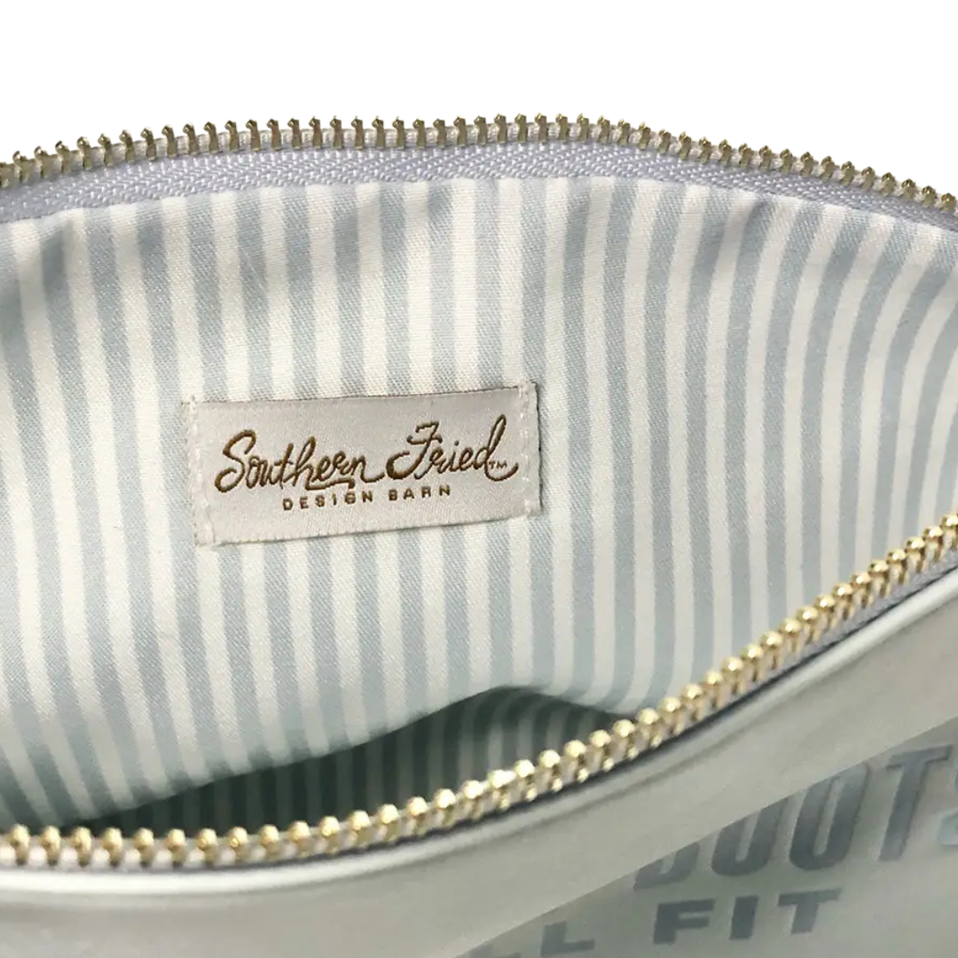 blue faux leather catch all pouch, lined with zipper.