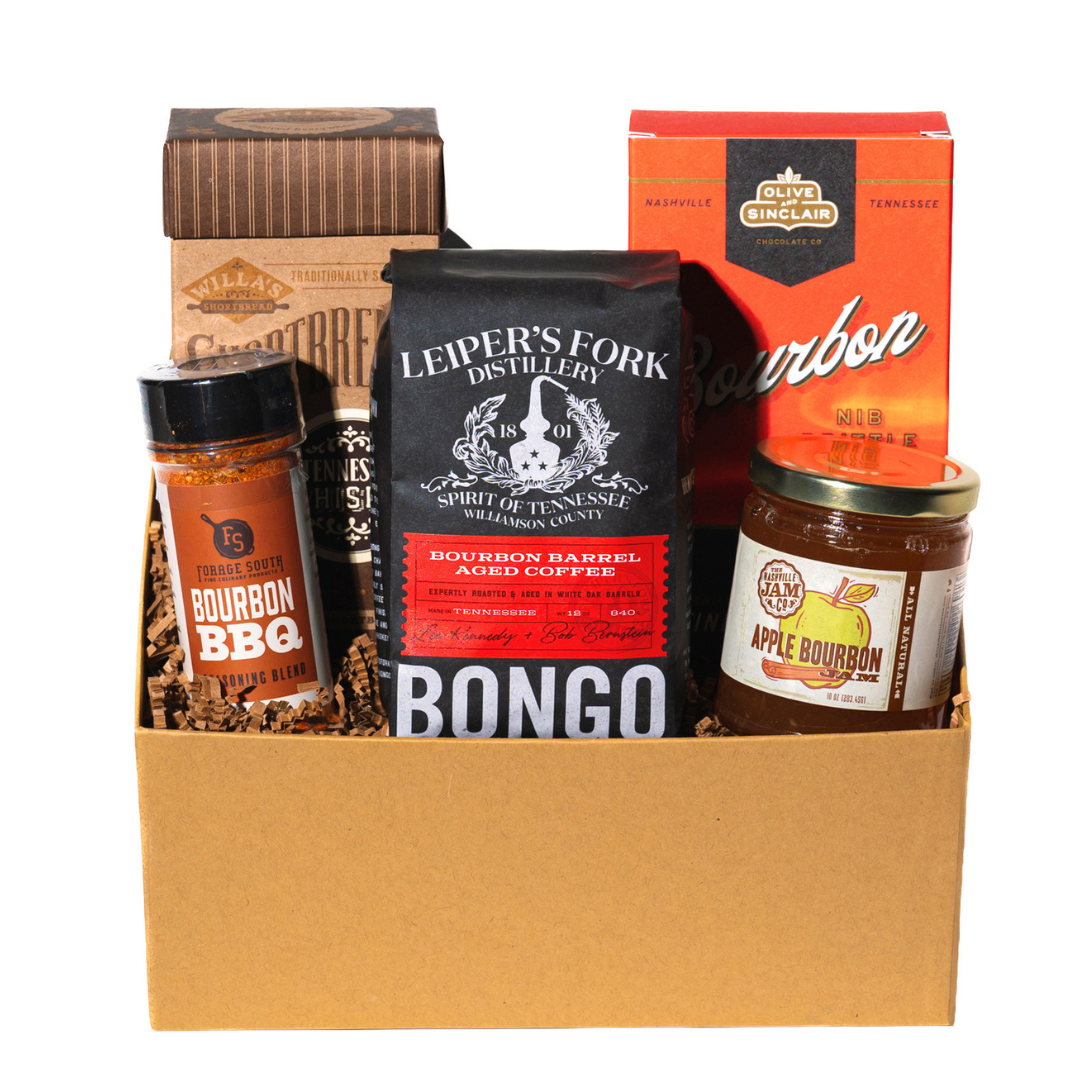 collection of bourbon and whiskey themed snacks, coffee and jam. 