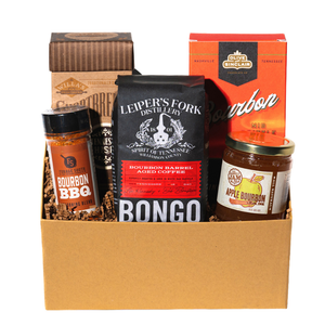 collection of bourbon and whiskey themed snacks, coffee and jam. 