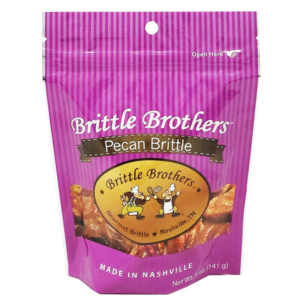 Nashville Pecan Brittle in 5 oz purple bag with brand logo and picture of the brittle. 