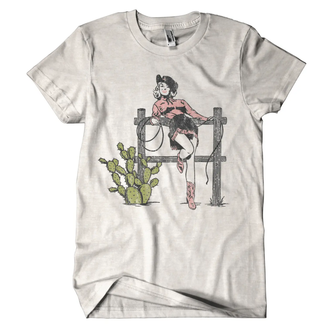 Soft grey shirt with screen-printed image of retro cowgirl.