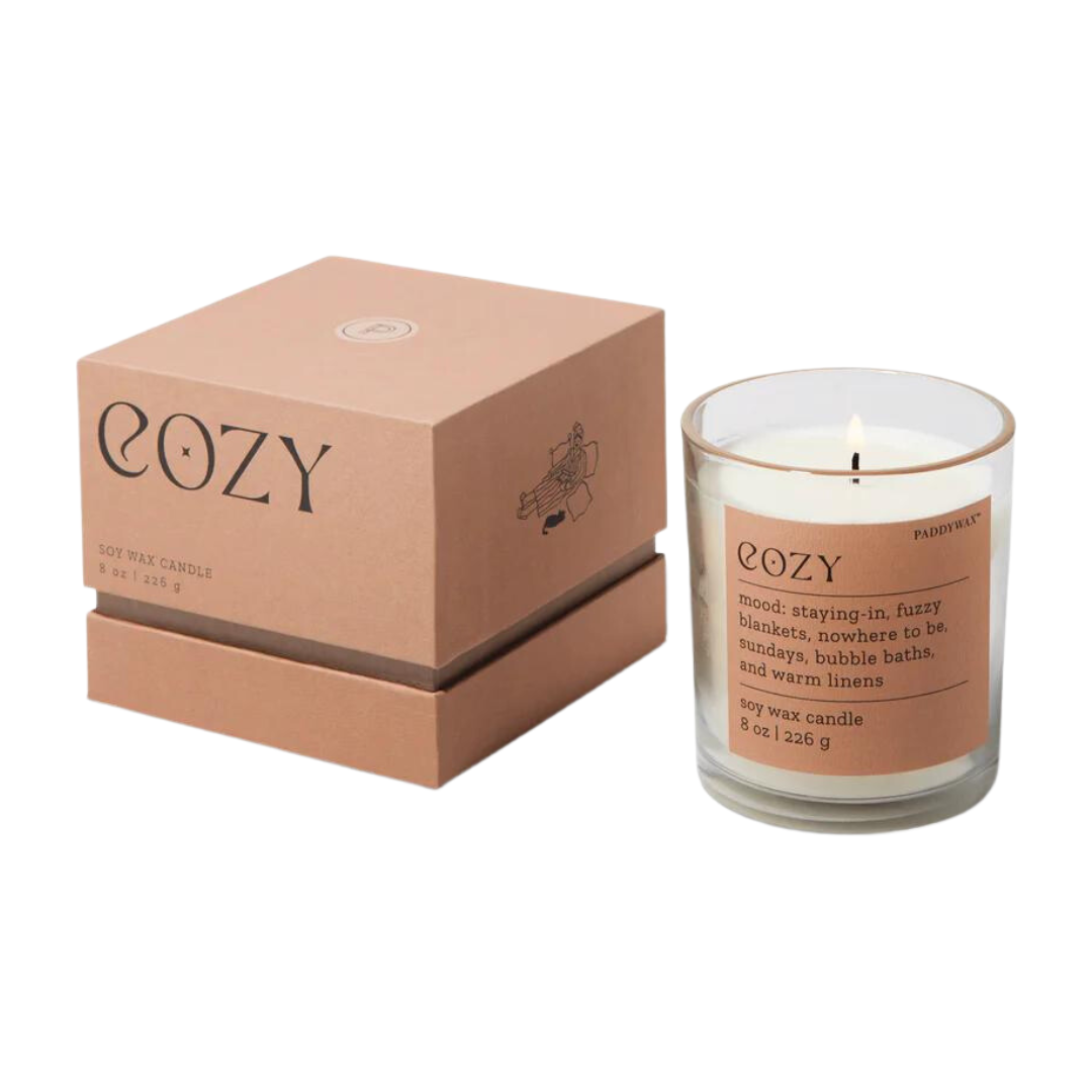 Check out the "COZY" candle from Paddywax that is sure to make those rainy days at home better, Smells of fuzzy blankets, bubble baths, and warm linens. 8 oz candle poured in Nashville, Tennessee.
