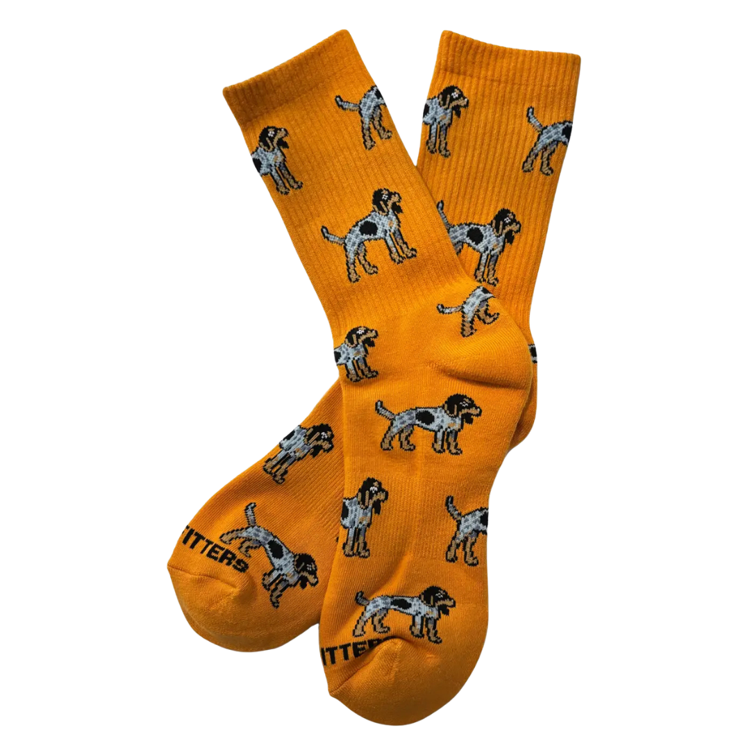 Orange socks with dogs for the gym. 