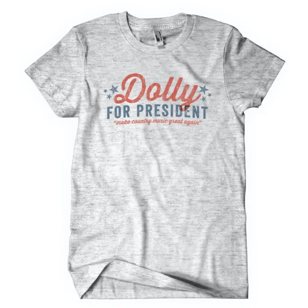 Soft grey shirt says "Dolly for President" in red and blue.