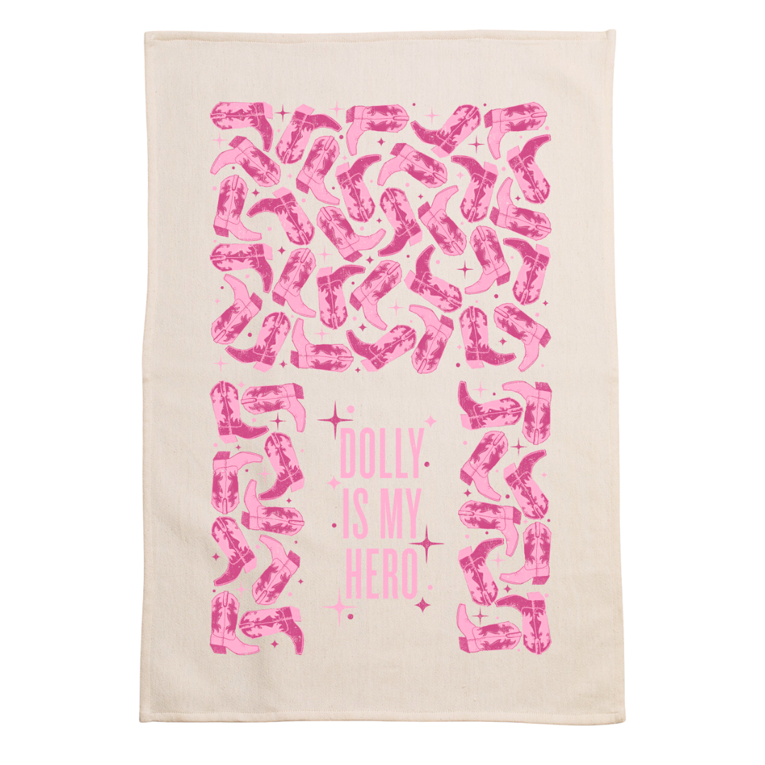 screen printed on cotton kitchen towel in hot pink, "Dolly is my hero"