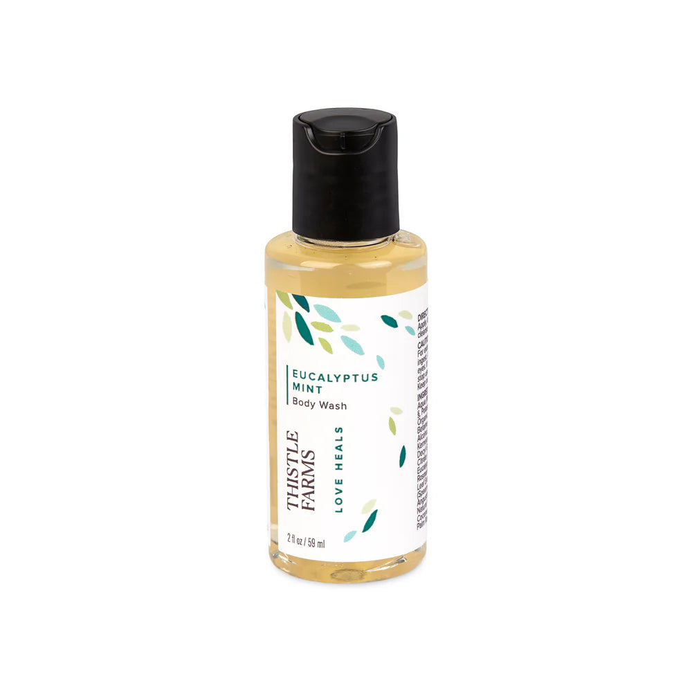 2 oz bottle of lavender body wash, purple petal design on white label.